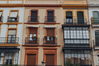 Traditional buildings on a street in seville, spain.