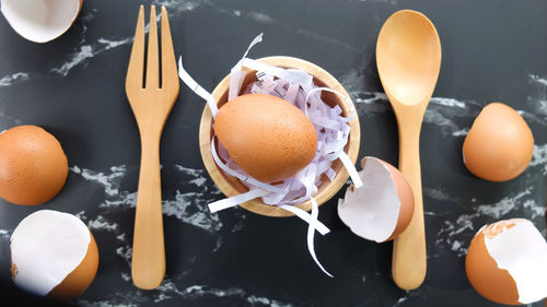 High angle view of eggs in container on table