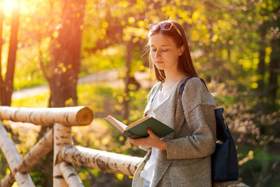 Young woman using mobile phone