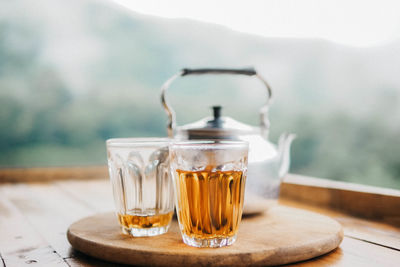 Close-up of tea in glass on table