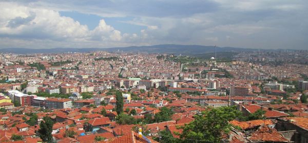 Aerial view of townscape against sky