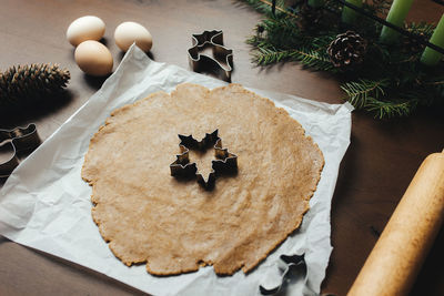 Cooking christmas gingerbread cookies on the kitchen. high quality photo