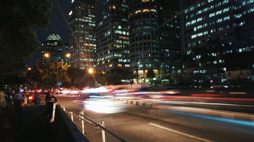 Traffic on city street at night