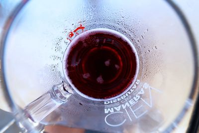 High angle view of glass of bottle