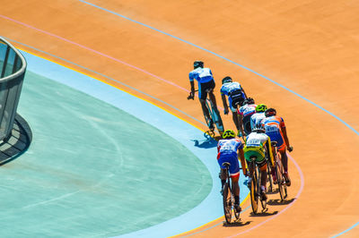 High angle view of people riding bicycle