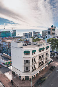 High angle view of buildings in city against sky