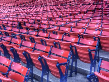 Empty chairs on soccer field