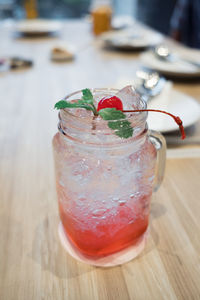 Close-up of drink on wooden table