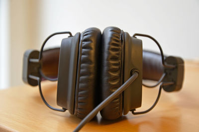 Close-up of headphones on table