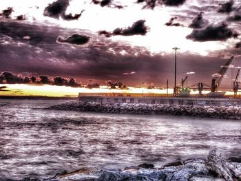 Scenic view of sea against cloudy sky