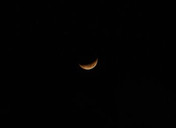 Scenic view of moon against sky at night