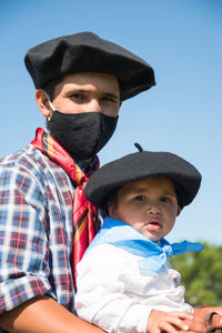 Argentinian father and son in traditional festival