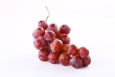 Close-up of raspberries against white background