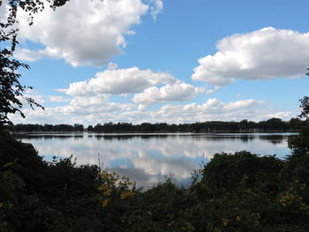 Reflection of sky on calm lake