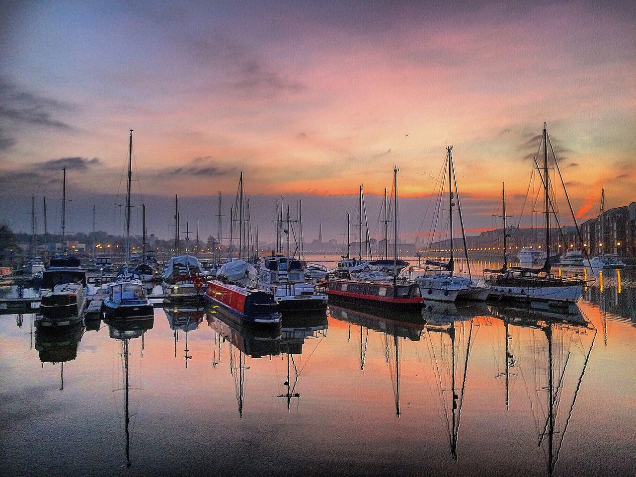 nautical vessel, water, moored, boat, transportation, mode of transport, reflection, mast, sky, sunset, waterfront, harbor, sea, sailboat, cloud - sky, tranquility, tranquil scene, nature, in a row, marina