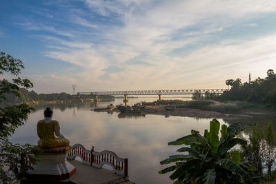 Scenic view of bridge against sky during sunset