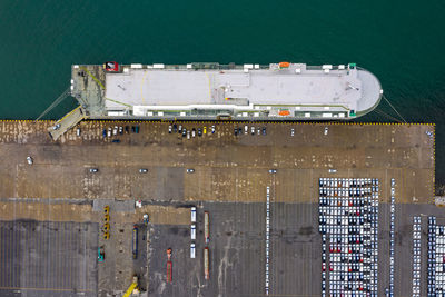 High angle view of ferry on pier over sea