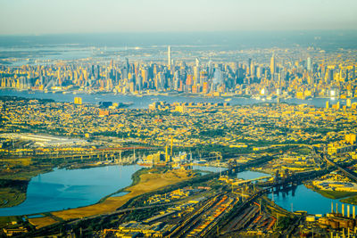 High angle view of river amidst buildings in city