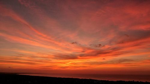 Scenic view of dramatic sky during sunset