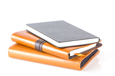 High angle view of books on white background