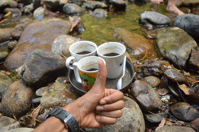 Person holding ice cream rocks