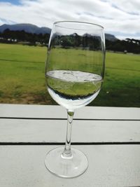 Close-up of wine glass on table