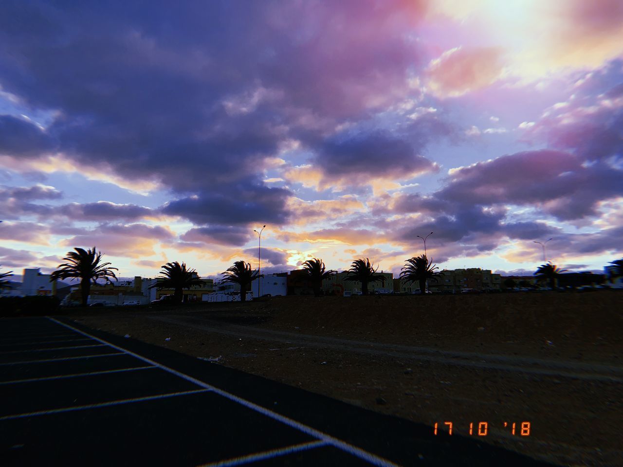 VIEW OF ROAD AGAINST SKY DURING SUNSET