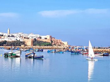 Boats moored in harbor