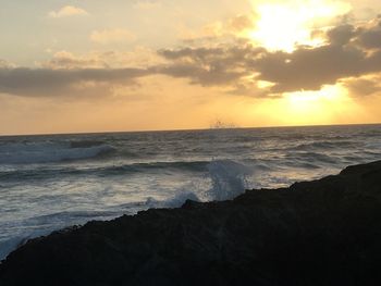 Scenic view of sea against sky during sunset
