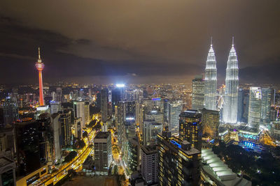 Illuminated buildings in city at night