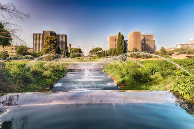 Scenic fountain near the eur artificial lake, modern district in the south of rome, italy