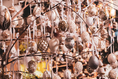 Close-up of decoration hanging on plant