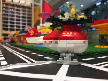 Close-up of traffic sign on road in city