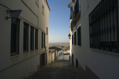 Empty street in spanish collage with far mountain view