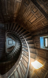 Directly below shot of spiral staircase in building