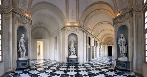 Low angle view of statues on historic building