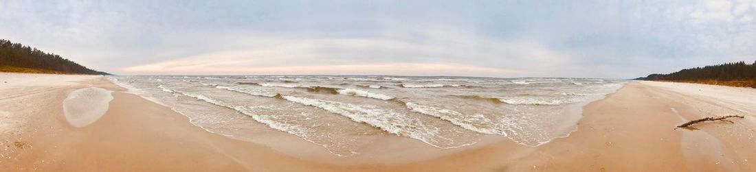 Panoramic view of beach against sky