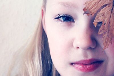 Close-up portrait of young woman