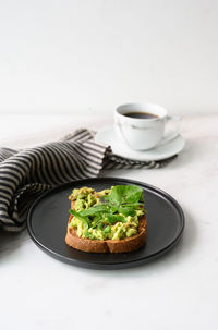 Close-up of breakfast served on table