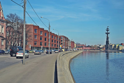 View of buildings against blue sky