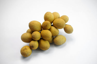 High angle view of fruits against white background
