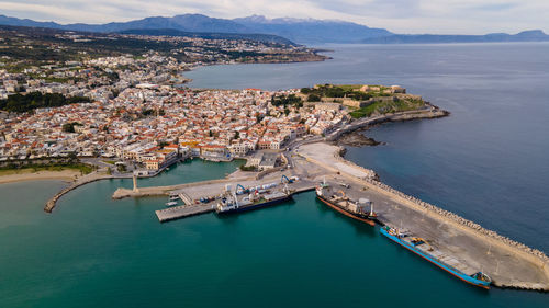 High angle view of town by sea