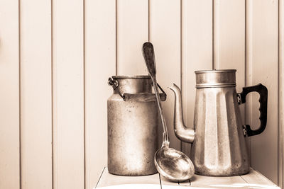 Close-up of kitchen utensils on table 