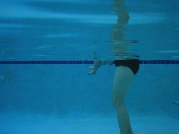 Reflection of woman in water