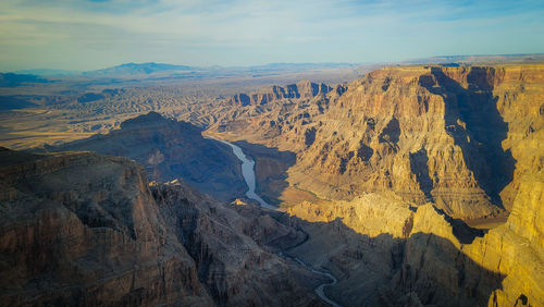 Panoramic view of rocky mountains against sky