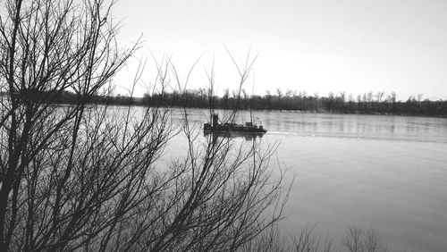 Scenic view of calm lake at sunset