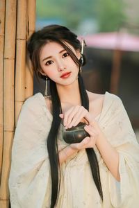 Young woman using mobile phone