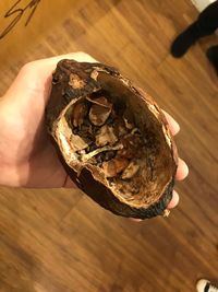 Close-up of hand holding ice cream