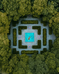 Fountain into pool inside compounds garden