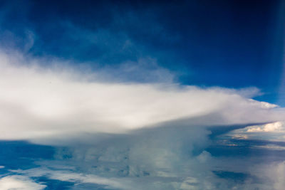 Scenic view of clouds over mountain